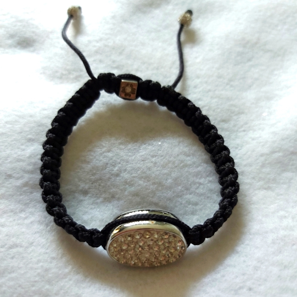 Braided black bracelet with diamond accent center